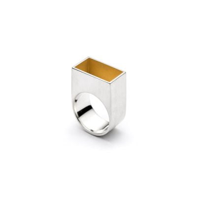 The Gropius ring from The Modernists collection is handmade by Julie Bégin using pure sterling silver with 24 k yellow gold.