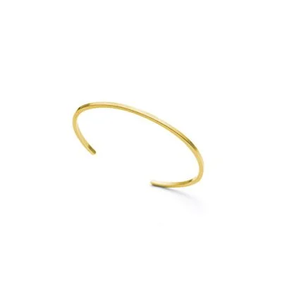 Le bracelet Mies de la collection The Modernists est fabriqué à la main par Julie Bégin en or jaune 14 carats.