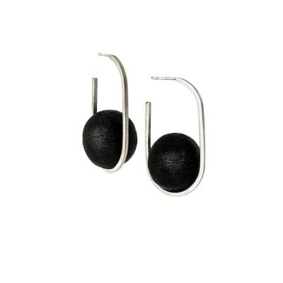 Orbital earrings from the Quantum collection, handcrafted by Julie Bégin using pure sterling silver and hand charred wood.